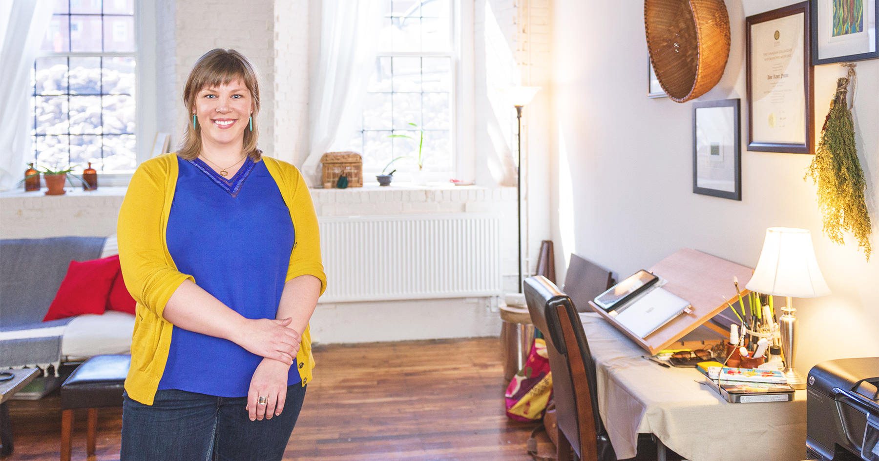 Aline Potvin, a naturopathic doctor poses for a photograph in her office at 'Your Own Wellness' photographed by Portland Headshot.